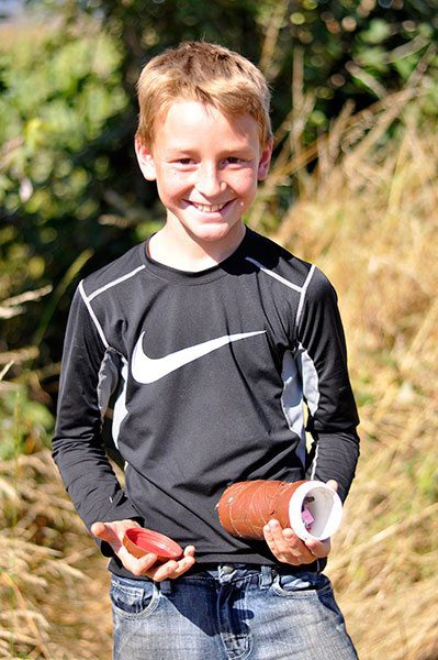 Zeyon Hurliman holds a cache
