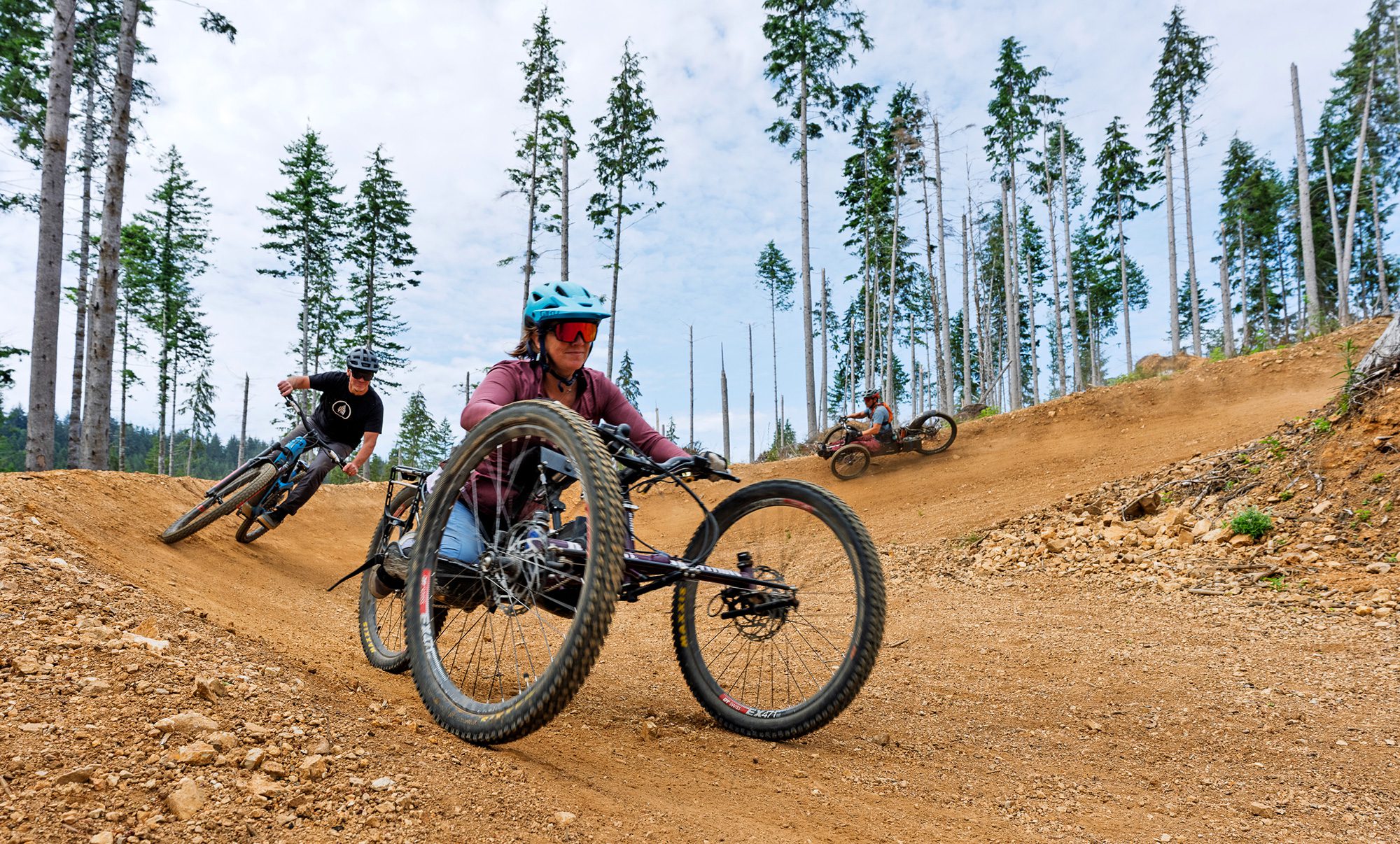 adaptive mountain biking three wheel recumbent bike dirt trail by benmoon